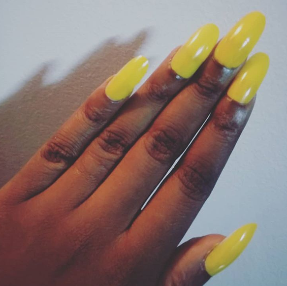 yellow almond shaped gel nails