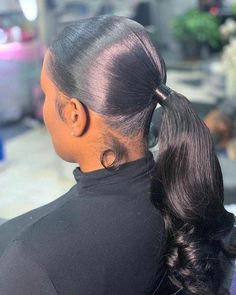 sleek black ponytail